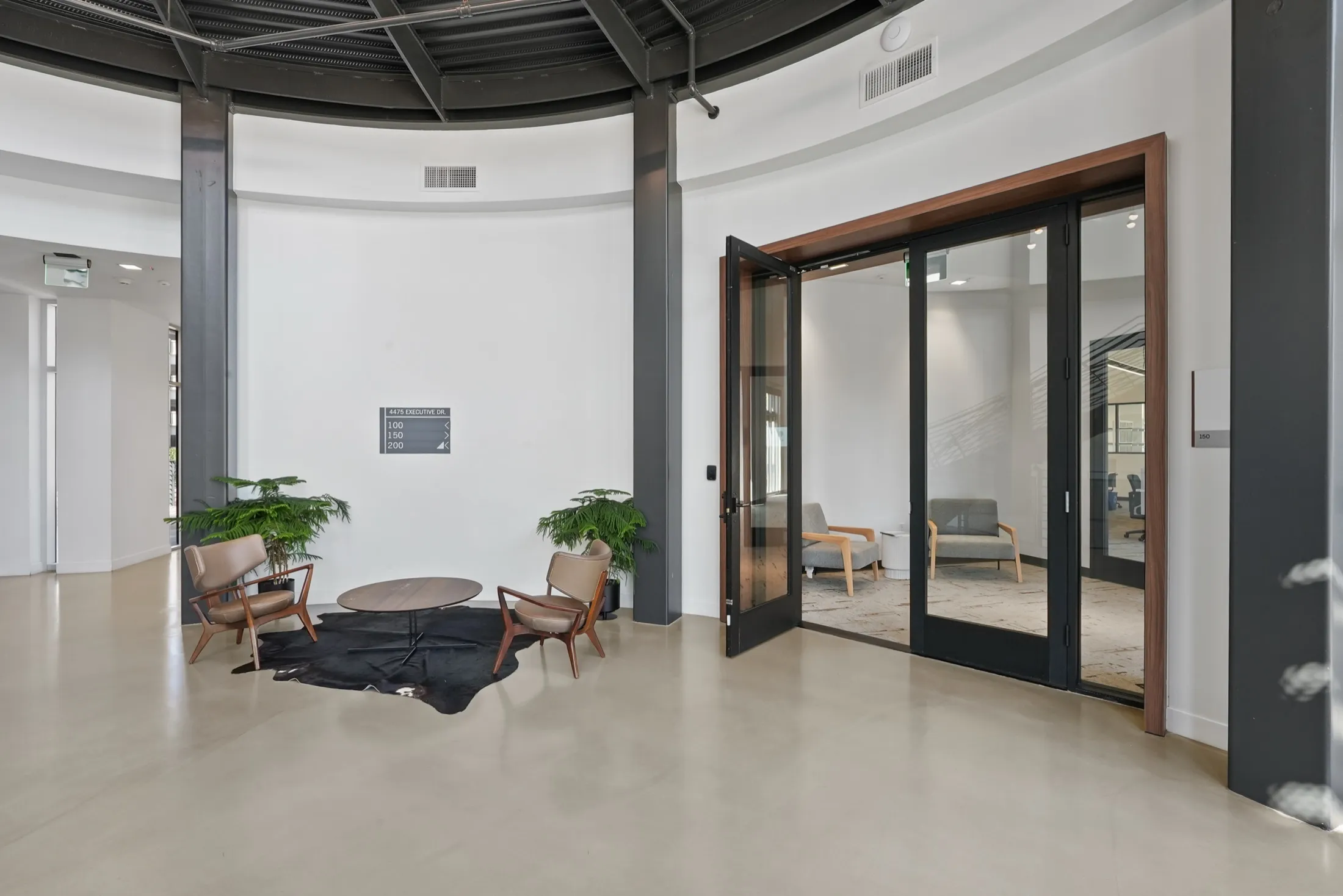 Ground-floor lobby lounge at 4475 Executive Drive, San Diego