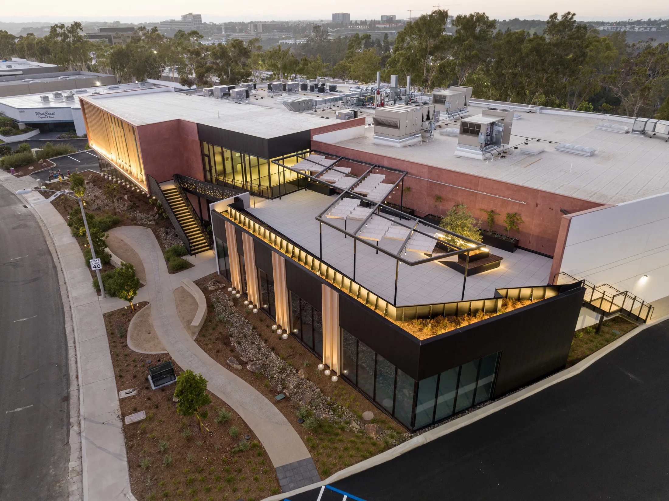Dusk aerial of 6610 Nancy Ridge, a two-story life science conversion in Sorrento Mesa