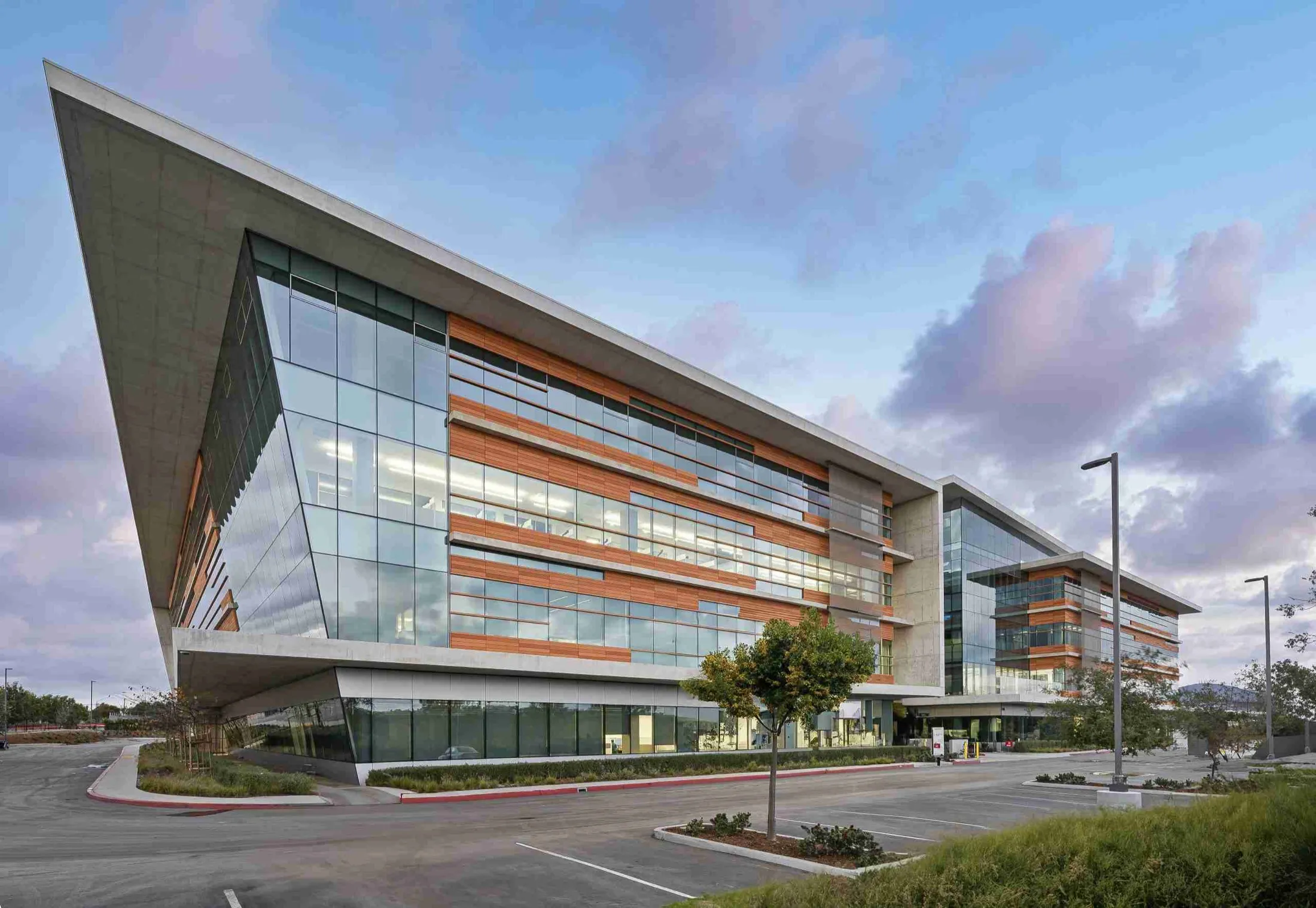 ADM, an office building in San Diego, at blue hour from the parking court