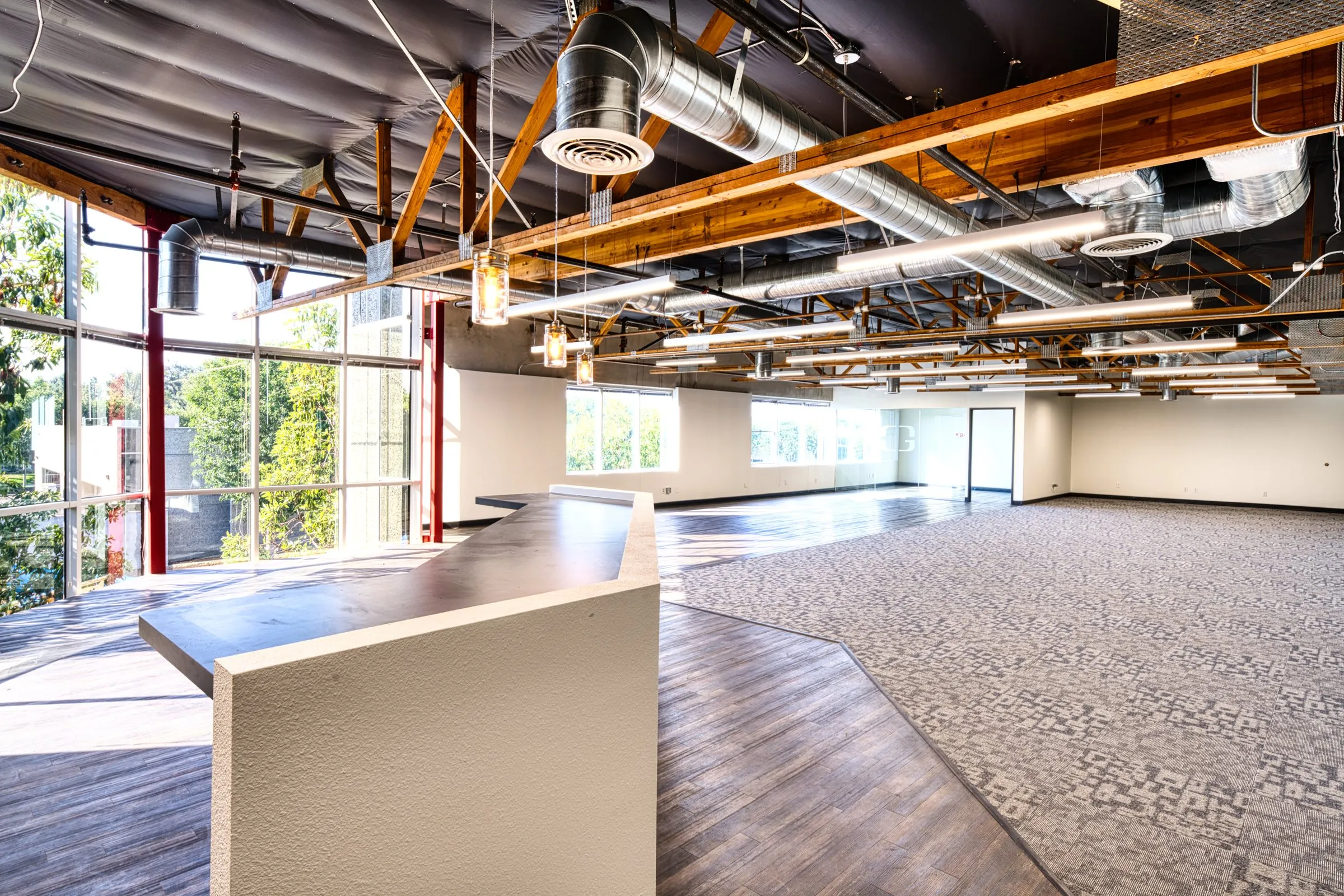 Creative office inside 2236 Rutherford Road, its glass wall and open floor