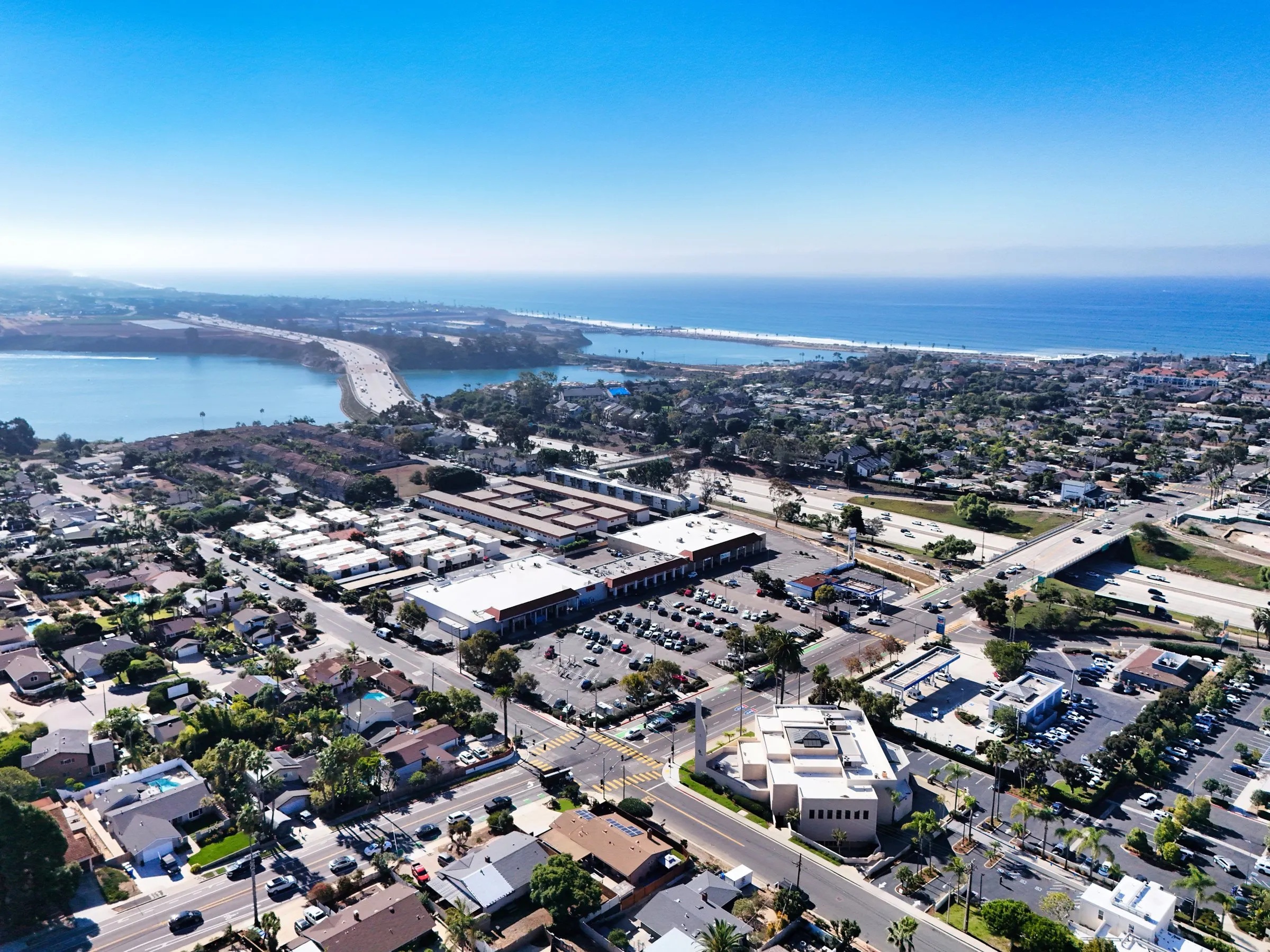 959 to 981 Tamarack Avenue in Carlsbad Village from the air, the lagoon and the ocean behind