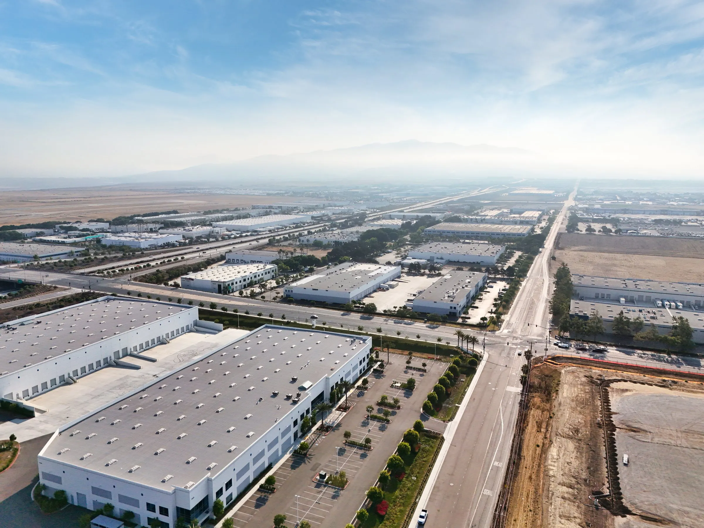 2055 Dublin Drive from the air, the industrial grid of Otay Mesa around it